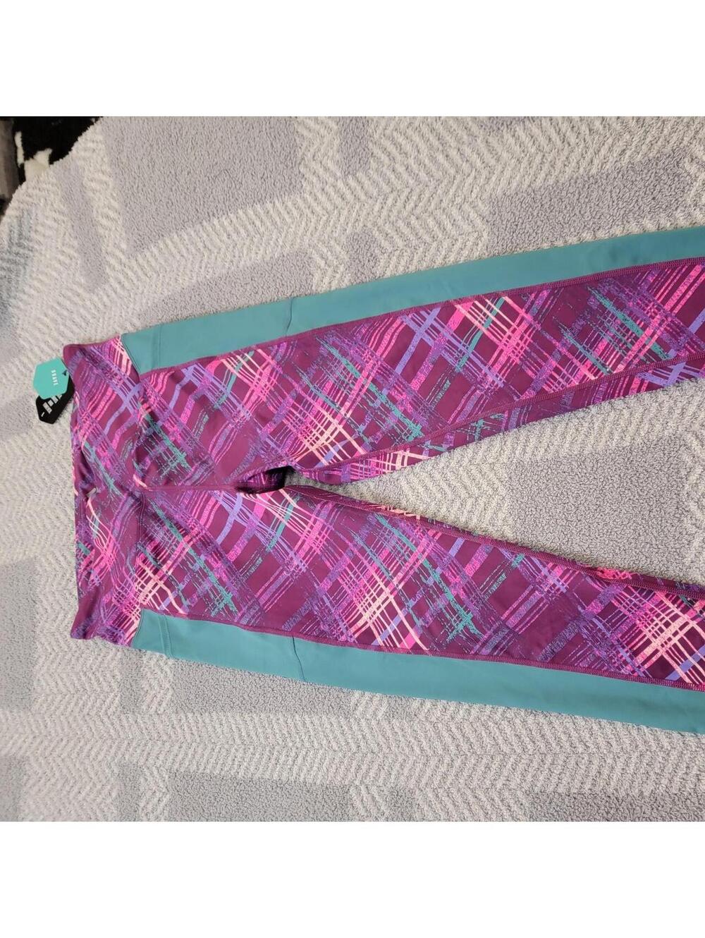 Lularoe Rise leggings with pink, purple, and teal plaid pattern